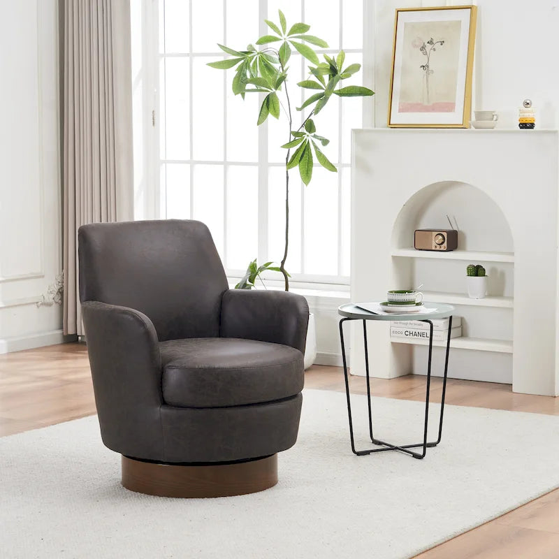 Sillón giratorio tapizado con base de acero inoxidable
