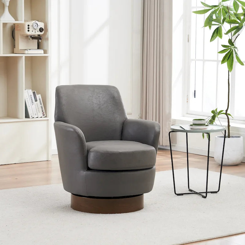 Sillón giratorio tapizado con base de acero inoxidable