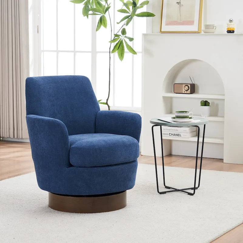 Sillón giratorio tapizado con base de acero inoxidable