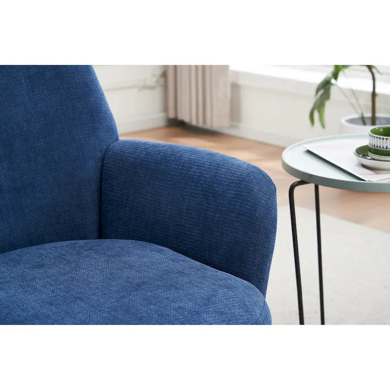 Sillón giratorio tapizado con base de acero inoxidable