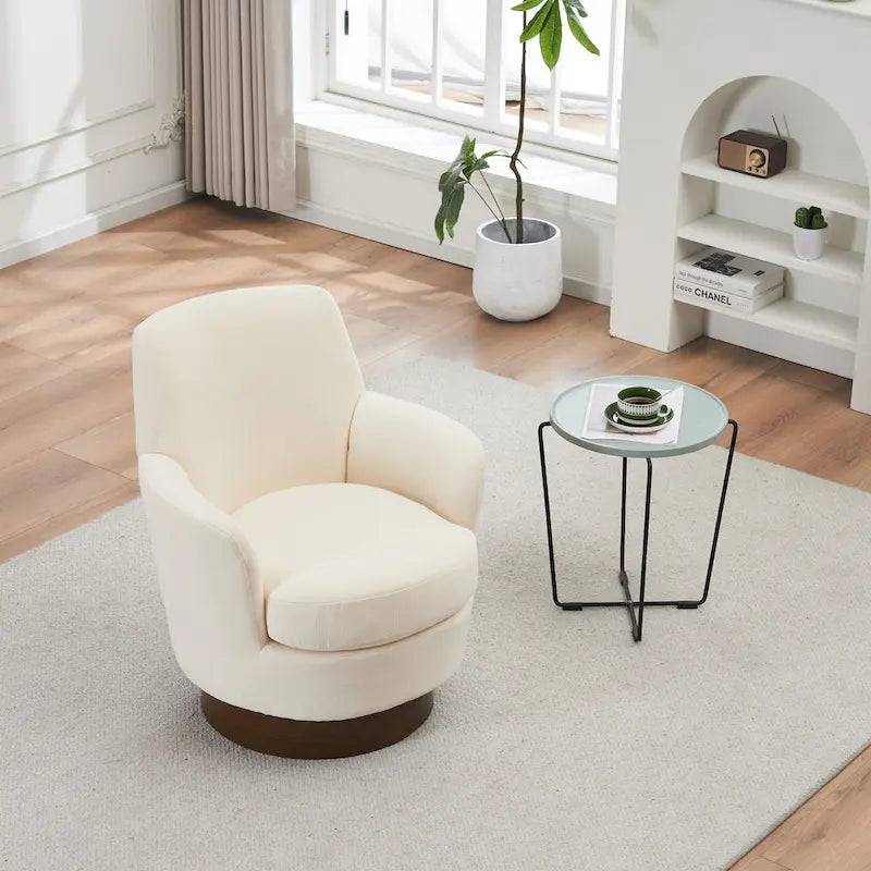 Sillón giratorio tapizado con base de acero inoxidable