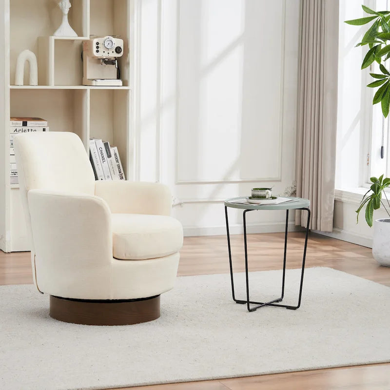 Sillón giratorio tapizado con base de acero inoxidable