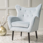 Sillón de orejas tapizado de mediados de siglo