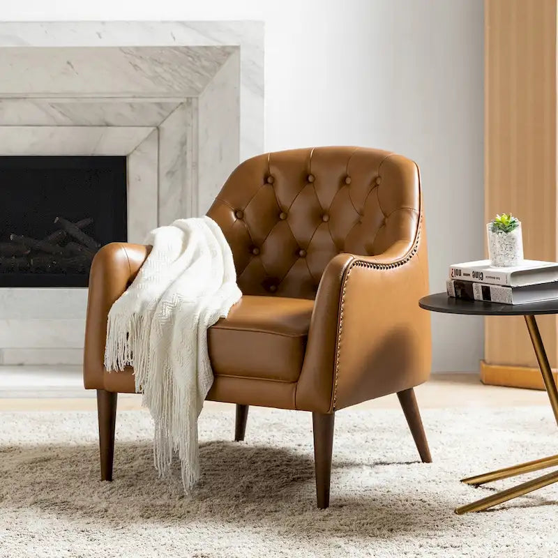 Sillón barril con respaldo capitoné y patas de madera