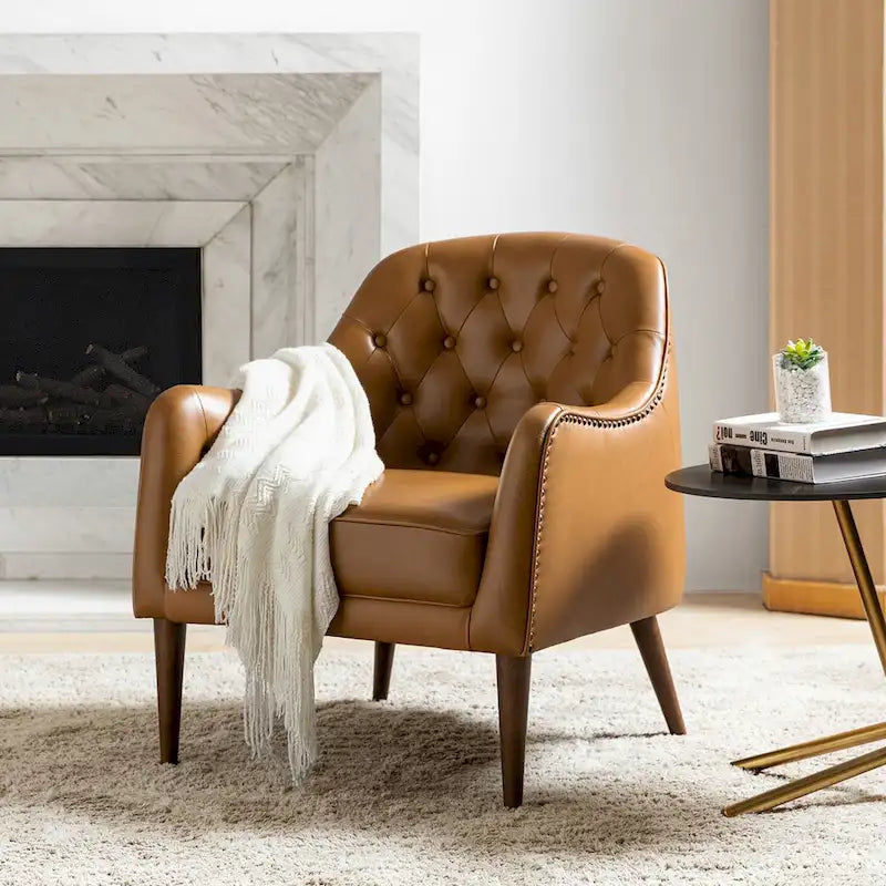 Sillón barril con respaldo capitoné y patas de madera