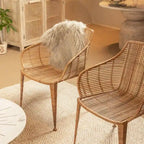 Sillón de ratán tejido a mano con patas de metal