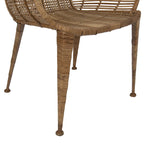 Sillón de ratán tejido a mano con patas de metal